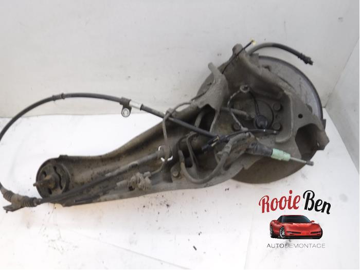 Knuckle, rear right from a Dodge Caliber 1.8 16V 2007