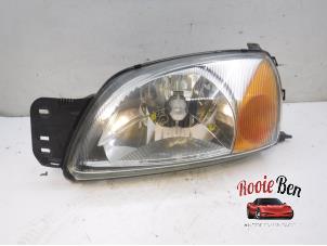 Used Headlight, left Ford Fiesta 4 1.3i Price € 20,00 Margin scheme offered by Rooie Ben autodemontage