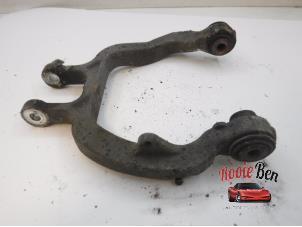 Used Rear upper wishbone, left Chrysler Voyager/Grand Voyager (RG) 2.5 CRD 16V Price on request offered by Rooie Ben autodemontage