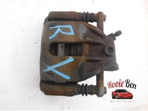 Used Front brake calliper, right Renault Clio IV (5R) 0.9 Energy TCE 90 12V Price on request offered by Rooie Ben autodemontage