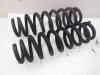 Rear coil spring from a BMW 3 serie (E90), 2005 / 2011 330i 24V, Saloon, 4-dr, Petrol, 2.996cc, 200kW (272pk), RWD, N53B30A, 2007-09 / 2011-10, PH31; PH32; PM11; PM12; VE71; VE72 2009