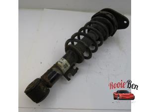 Used Rear shock absorber rod, left BMW Mini One/Cooper (R50) 1.6 16V Cooper Price € 30,00 Margin scheme offered by Rooie Ben autodemontage