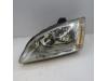 Headlight, left from a Ford Focus 2 Wagon 1.6 TDCi 16V 110 2007