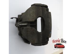 Used Front brake calliper, left Volkswagen Transporter T5 2.0 BiTDI DRF Price on request offered by Rooie Ben autodemontage