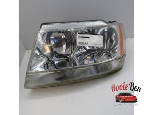 Used Headlight, left Jeep Grand Cherokee (WG/WJ) 4.0i Price on request offered by Rooie Ben autodemontage