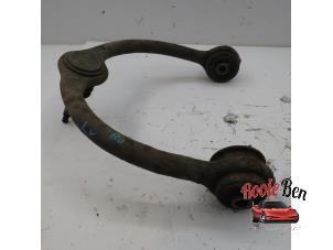Used Front upper wishbone, left Jeep Grand Cherokee (WH/WK) 3.0 CRD V6 24V DPF Price on request offered by Rooie Ben autodemontage
