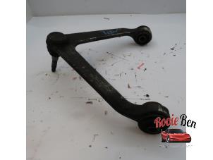 Used Front upper wishbone, left Dodge Ram 3500 Standard Cab (DR/DH/D1/DC/DM) 8.3 1500 SRT-10 Crew Cab Price on request offered by Rooie Ben autodemontage