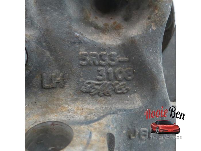 Knuckle, front left from a Ford (USA) Mustang V 4.0 V6 2006