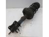Opel Corsa D 1.2 16V Front shock absorber rod, right