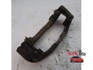 Used Front brake calliperholder, left Mercedes Sprinter 5t (906.63/65) 513 CDI 16V Price on request offered by Rooie Ben autodemontage