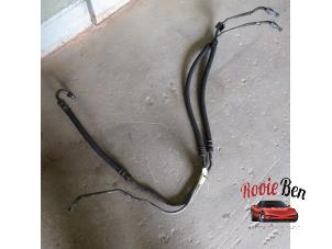 Used Power steering line Chrysler Voyager/Grand Voyager (RG) 2.8 CRD 16V Autom. Price on request offered by Rooie Ben autodemontage