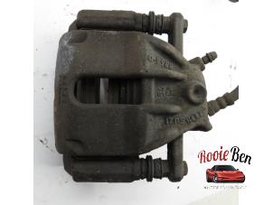 Used Front brake calliper, right Renault Clio III (BR/CR) 1.5 dCi FAP Price on request offered by Rooie Ben autodemontage
