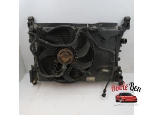 Used Radiator Opel Corsa D 1.2 16V LPG Price on request offered by Rooie Ben autodemontage