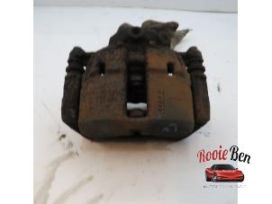 Used Front brake calliper, left Mitsubishi Colt (Z2/Z3) 1.5 DI-D 12V HP Price € 35,00 Margin scheme offered by Rooie Ben autodemontage