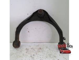 Used Front upper wishbone, left Dodge 1500 Crew Cab (DS/DJ/D2) 5.7 Hemi V8 4x4 Price on request offered by Rooie Ben autodemontage