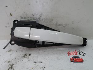 Used Rear door handle 4-door, right Chevrolet Orlando (YYM/YYW) 2.0 D 16V Price on request offered by Rooie Ben autodemontage