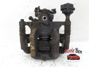 Used Rear brake calliper, left Chevrolet Orlando (YYM/YYW) 2.0 D 16V Price on request offered by Rooie Ben autodemontage