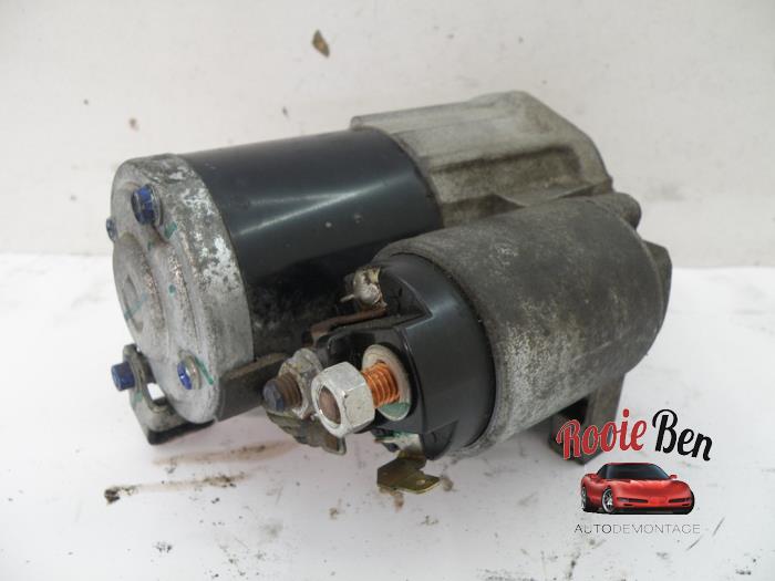 Anlasser van een Mitsubishi Space Star (A0) 1.0 12V 2018
