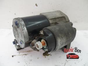 Anlasser van een Mitsubishi Space Star (A0) 1.0 12V 2018
