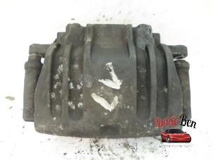 Used Front brake calliper, left Chrysler 300 C 2.7 V6 24V Price on request offered by Rooie Ben autodemontage