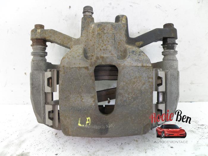Rear brake calliper, left from a Ford (USA) F-150 Standard Cab 5.0 Extended Cab 2013