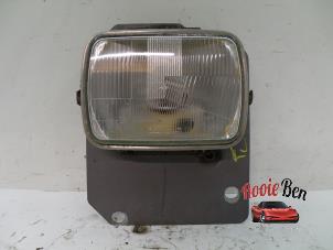Used Headlight, left Dodge B-Serie B150 5.2 V8 EFI Price on request offered by Rooie Ben autodemontage
