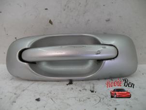 Used Sliding door handle, right Chrysler Voyager/Grand Voyager (RG) 2.5 CRD Price on request offered by Rooie Ben autodemontage