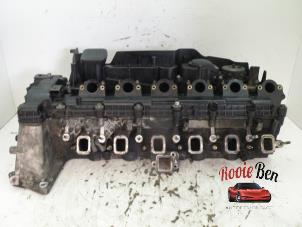 Used Cylinder head BMW X3 (E83) 3.0d 24V Price on request offered by Rooie Ben autodemontage