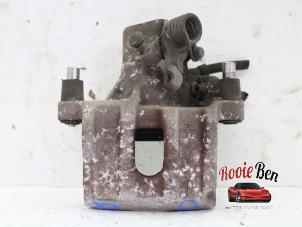 Used Rear brake calliper, right Volvo C30 (EK/MK) 1.6 16V Price on request offered by Rooie Ben autodemontage