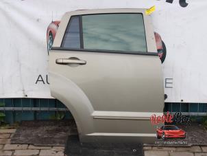 Używane Drzwi prawe tylne wersja 4-drzwiowa Dodge Caliber 2.0 16V Cena na żądanie oferowane przez Rooie Ben autodemontage
