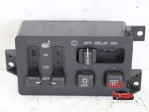 Used Seat heating switch Jeep Grand Cherokee (WG/WJ) 5.2i V8 Price on request offered by Rooie Ben autodemontage