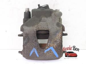 Used Front brake calliper, left Seat Ibiza ST (6J8) 1.4 16V Price on request offered by Rooie Ben autodemontage