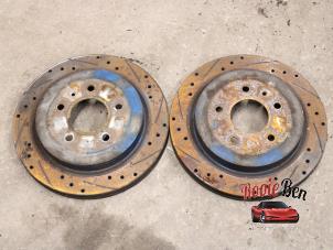 Used Rear brake disc Cadillac CTS I 3.2 V6 24V Price on request offered by Rooie Ben autodemontage