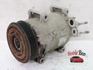 Used Air conditioning pump Ssang Yong Tivoli 1.6 e-XGi 16V 4WD Price on request offered by Rooie Ben autodemontage