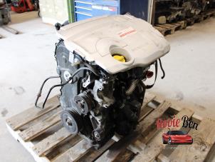 Engine from a Renault Laguna III Estate (KT) 2.0 dCi 16V 150 2010