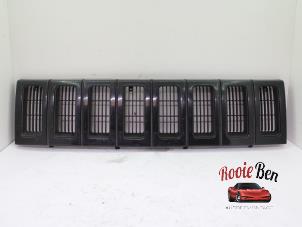 Used Grille Jeep Grand Cherokee (ZJ) 4.0i Price on request offered by Rooie Ben autodemontage