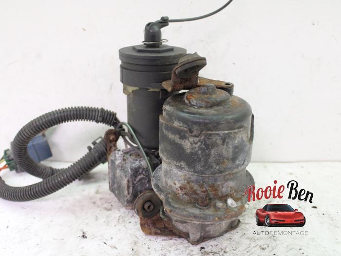 Luftpump (fjädring) från en Chevrolet Trans Sport 3.4 V6 2001