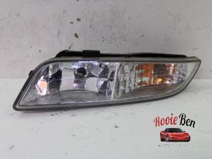 Used Headlight, left Ssang Yong Rexton 2.3 16V RX 230 Price on request offered by Rooie Ben autodemontage