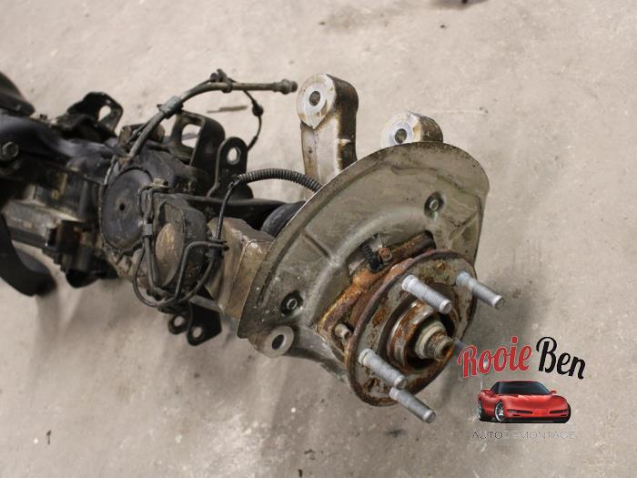 Front axle (complete) from a Jeep Wrangler Unlimited (JL) 2.0 XE4 380 16V 2021