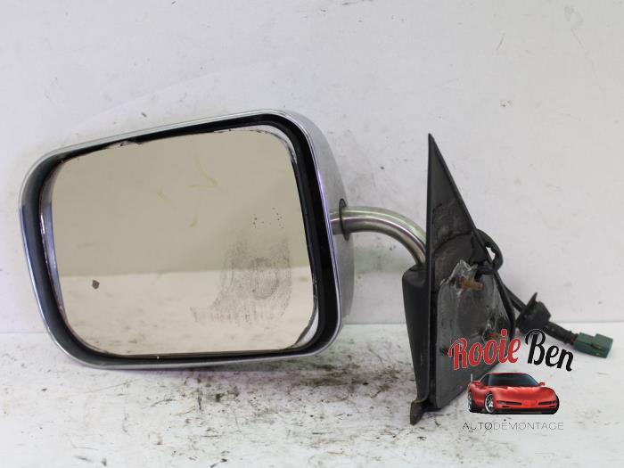 Außenspiegel links van een Dodge Ram 3500 (BR/BE) 5.2 1500 4x2 Kat. 1998