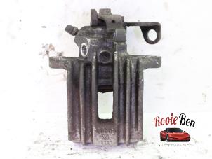 Used Rear brake calliper, left Seat Ibiza IV (6J5) 1.0 EcoTSI 12V Price on request offered by Rooie Ben autodemontage