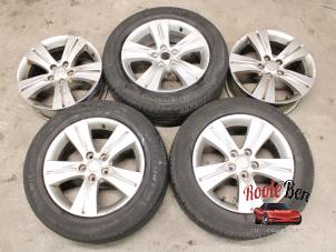Used Sport rims set + tires Kia Sportage (SL) 2.0 CRDi HP 16V VGT 4x4 Price on request offered by Rooie Ben autodemontage
