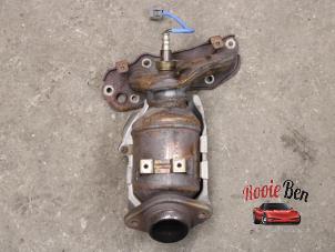Used Exhaust manifold + catalyst Nissan Note (E12) 1.2 68 Price on request offered by Rooie Ben autodemontage