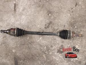 Used Front drive shaft, left Nissan Pixo (D31S) 1.0 12V Price on request offered by Rooie Ben autodemontage