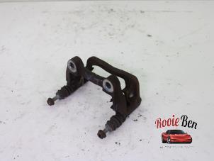 Used Rear brake calliperholder, left Mercedes A (W176) 1.6 A-180 16V Price on request offered by Rooie Ben autodemontage