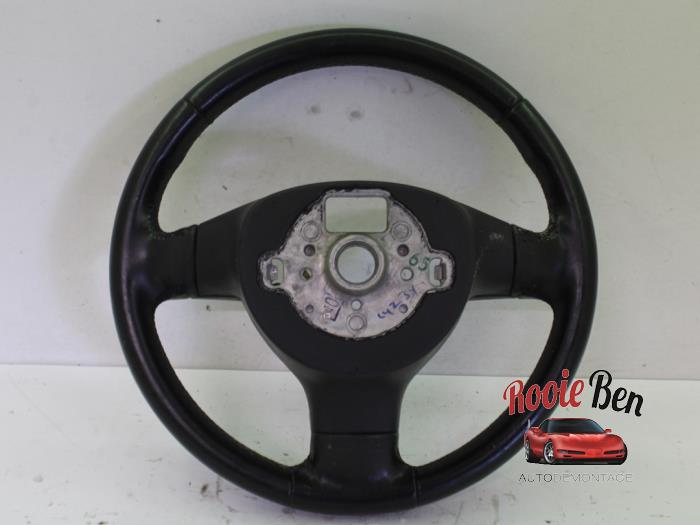 Steering wheel from a Volkswagen Golf V Variant (1K5) 2.0 TDI 16V 2009