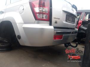 Used Rear bumper Jeep Grand Cherokee (WH/WK) 5.7 V8 Hemi Price on request offered by Rooie Ben autodemontage