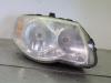 Headlight, right from a Chrysler Voyager/Grand Voyager (RG), 2000 / 2008 2.8 CRD 16V Autom., MPV, Diesel, 2.776cc, 110kW (150pk), FWD, ENR, 2004-06 / 2008-12 2008