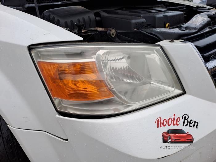 Używane Reflektor prawy Dodge Grand Caravan 4.0 Cena na żądanie oferowane przez Rooie Ben autodemontage