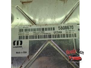 Engine management computer from a RAM 1500 Crew Cab (DS) 5.7 Hemi V8 4x4 2023